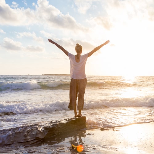 woman standing on beach